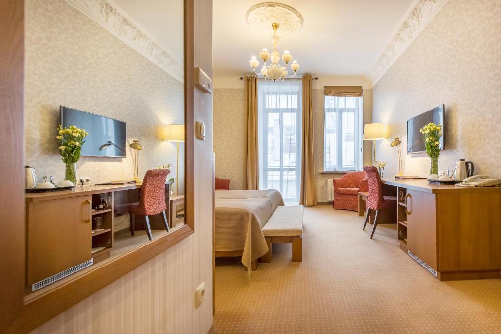TV a/nebo společenská místnost v ubytování Artis Centrum Hotels