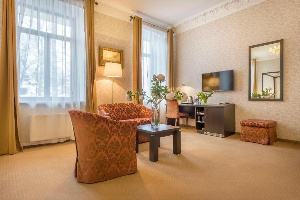 TV a/nebo společenská místnost v ubytování Artis Centrum Hotels