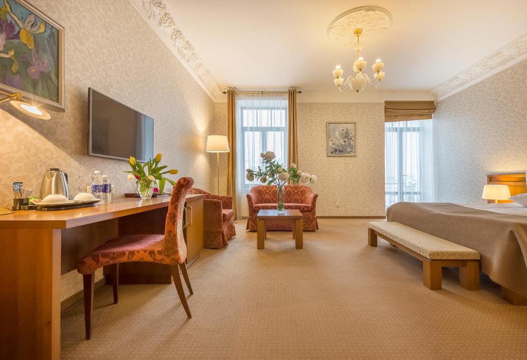 TV a/nebo společenská místnost v ubytování Artis Centrum Hotels