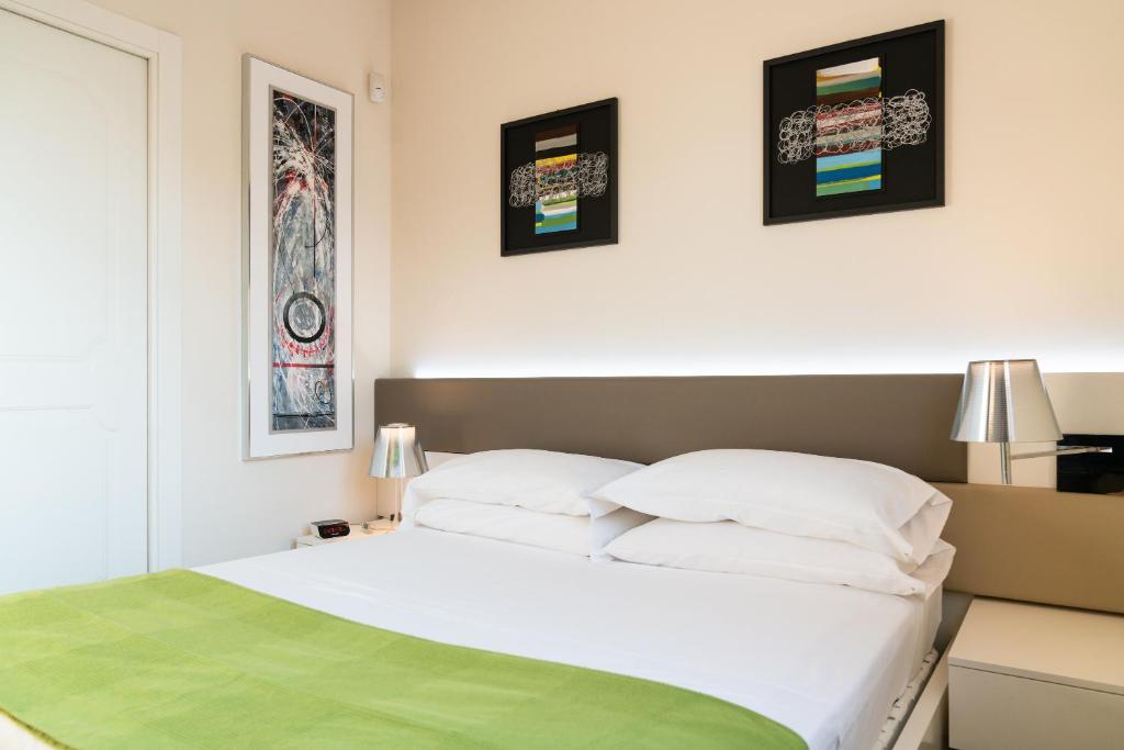 Letto o letti in una camera di B&B Pellicano Guest House