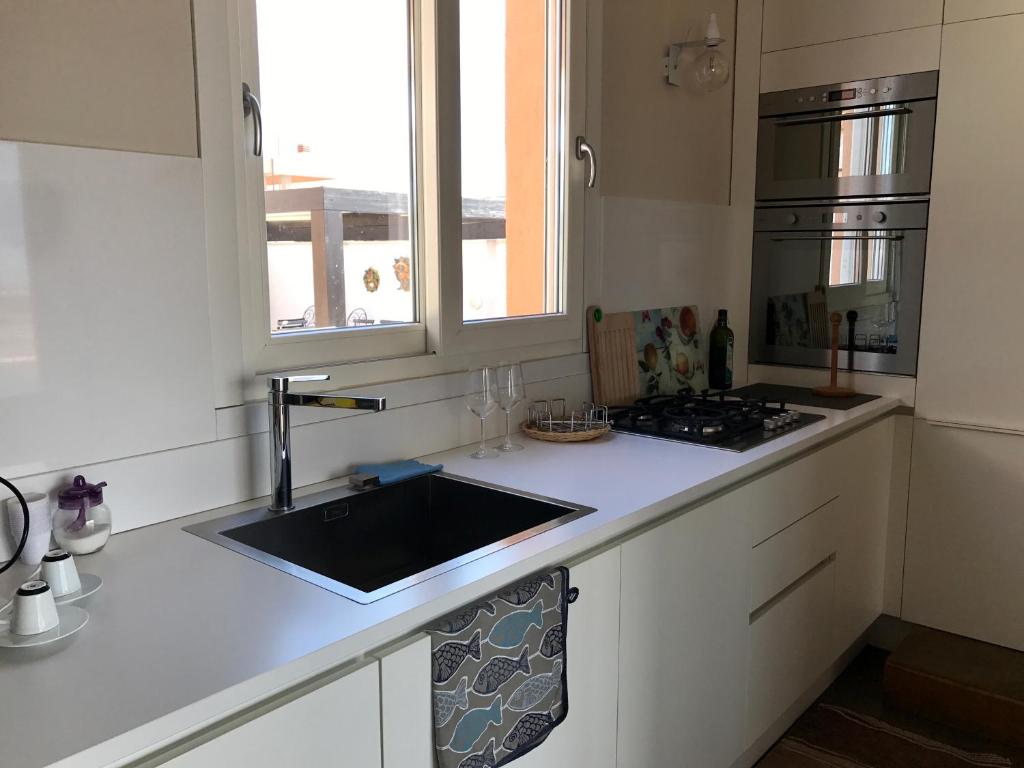 Cucina o angolo cottura di B&B Pellicano Guest House