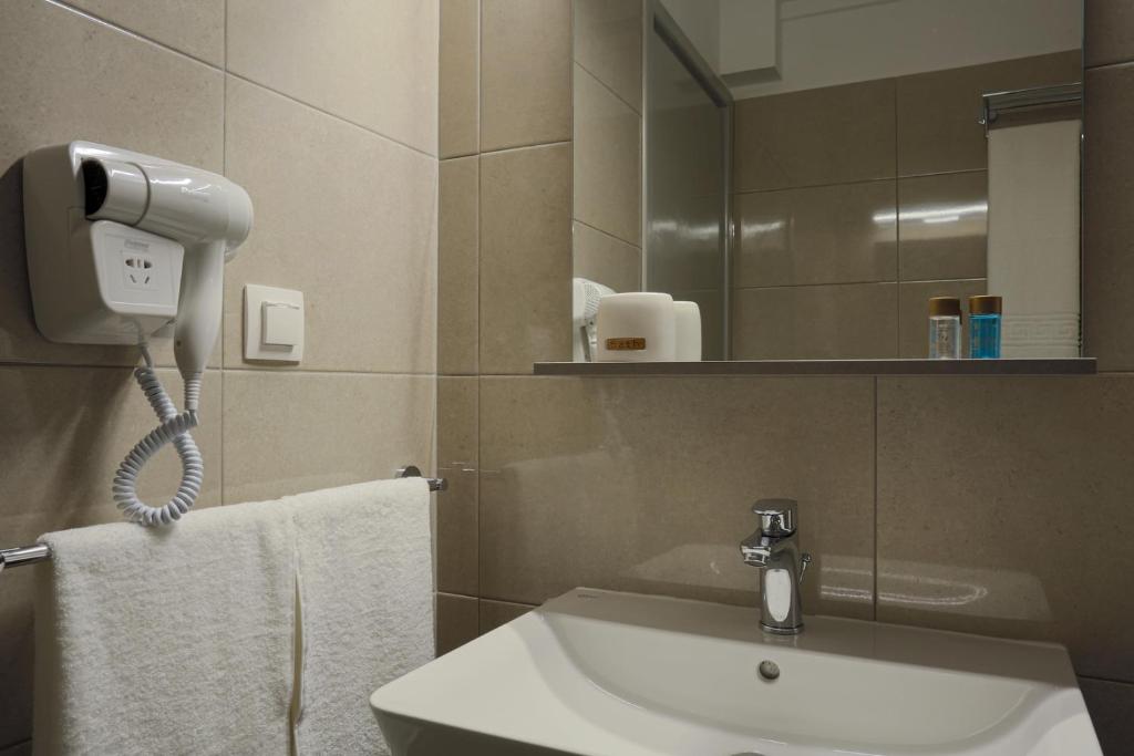 Koupelna v ubytování Hotel Alkyon