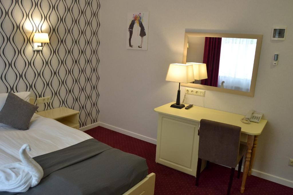 Postel nebo postele na pokoji v ubytování Hotel Ajur