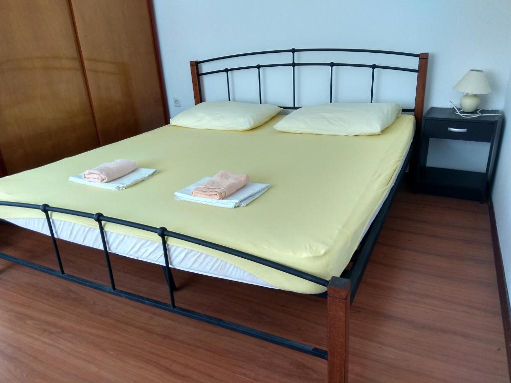 Posteľ alebo postele v izbe v ubytovaní Apartments Grkinić