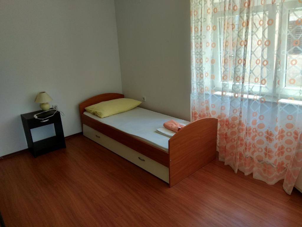 Posteľ alebo postele v izbe v ubytovaní Apartments Grkinić