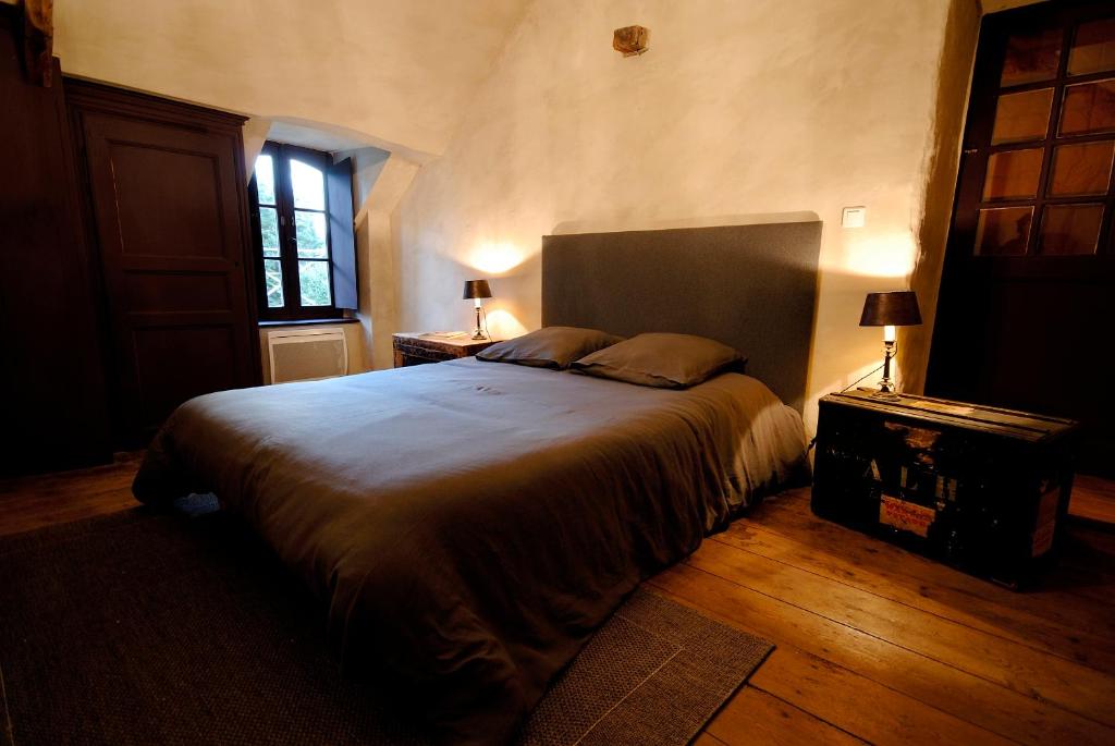 Postel nebo postele na pokoji v ubytování Manoir de la Villeneuve