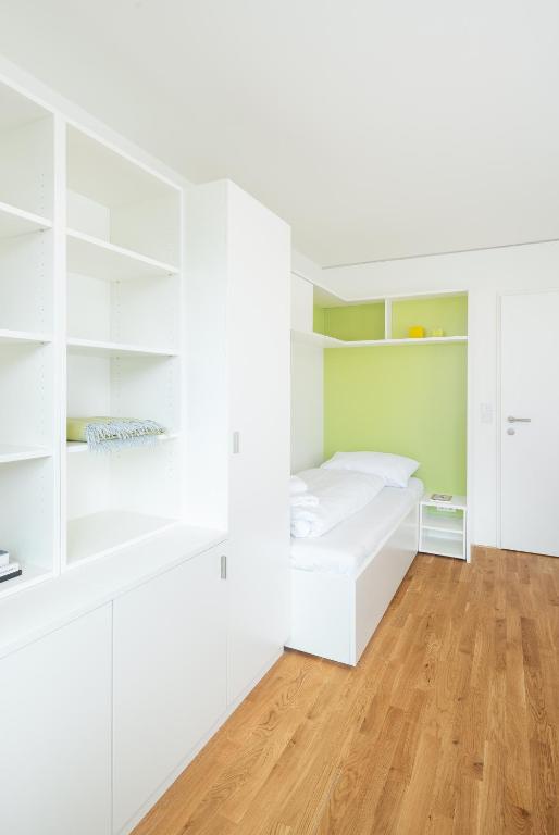Postel nebo postele na pokoji v ubytování myNext - Hotel Leo