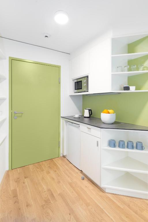Kuchyň nebo kuchyňský kout v ubytování myNext - Hotel Leo