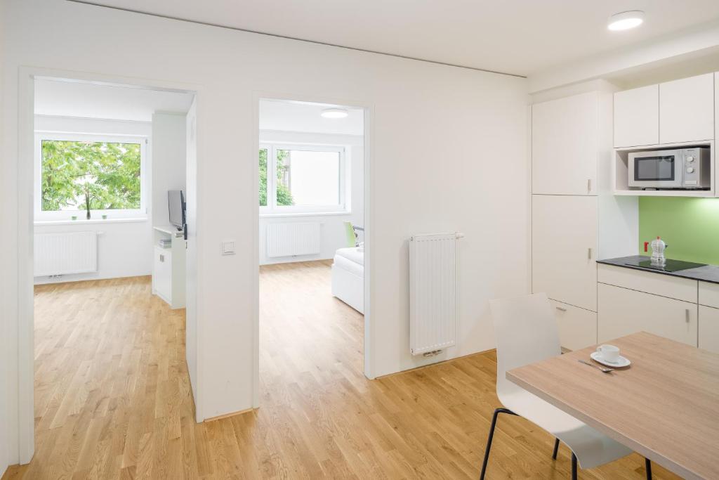 Kuchyň nebo kuchyňský kout v ubytování myNext - Hotel Leo