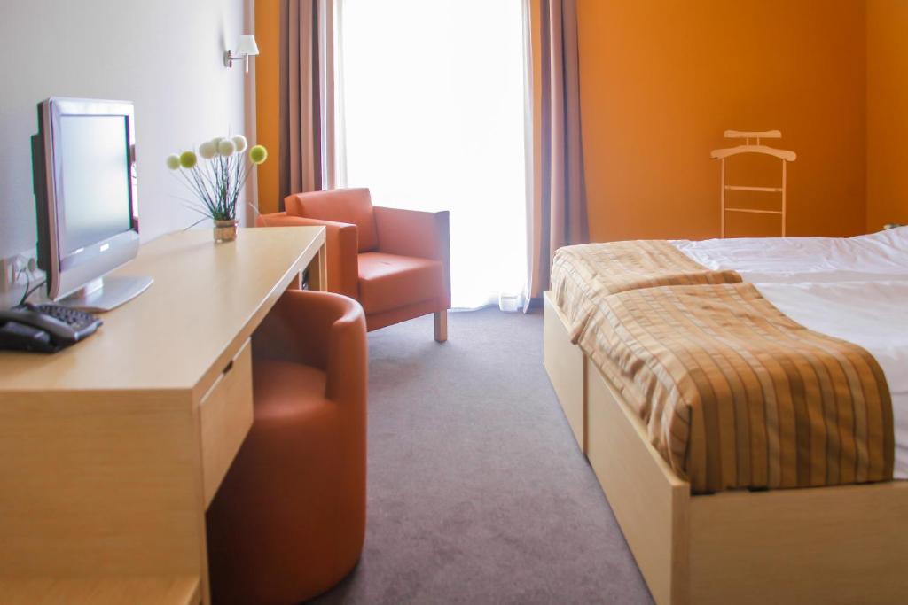 Postel nebo postele na pokoji v ubytování Hotel Veter