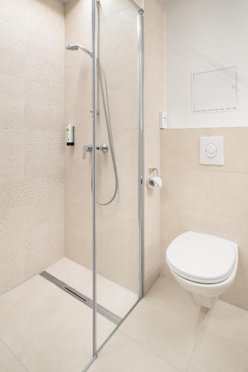 Koupelna v ubytování myNext - Hotel Leo