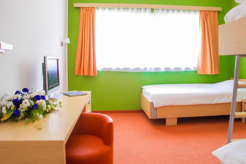 Postel nebo postele na pokoji v ubytování Hotel Veter