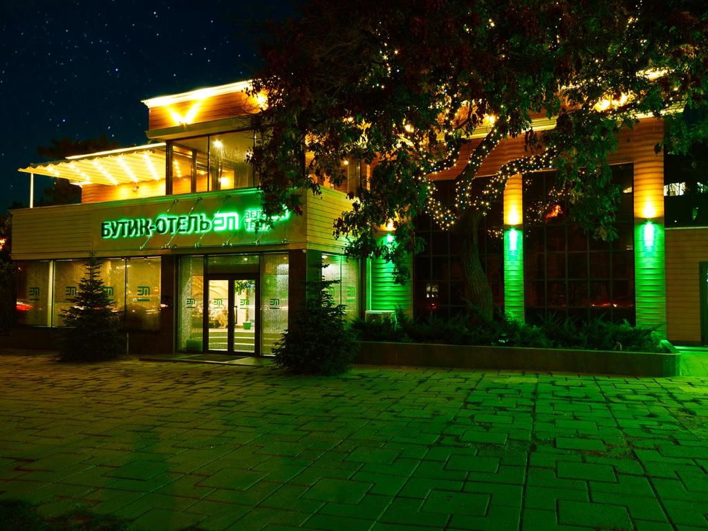 a building with green lights in front of it at Boutique Hotel Zelenyy Teatr in Simferopol