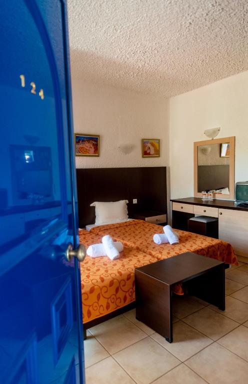 Postel nebo postele na pokoji v ubytování Hotel Elena Syvota