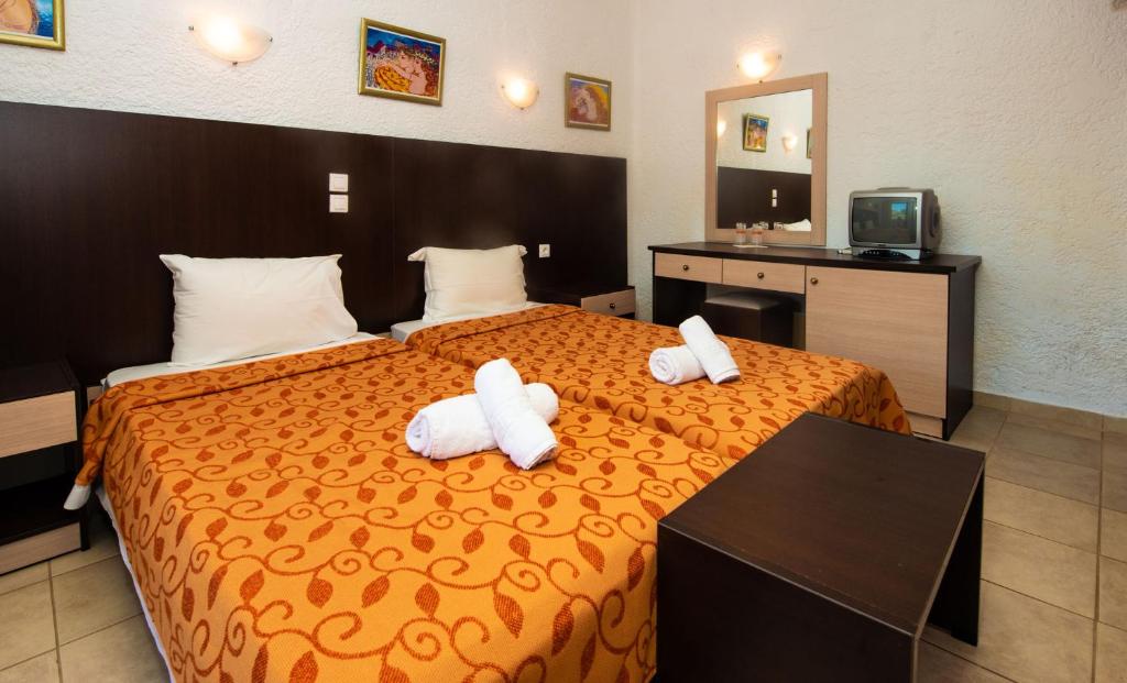 Postel nebo postele na pokoji v ubytování Hotel Elena Syvota