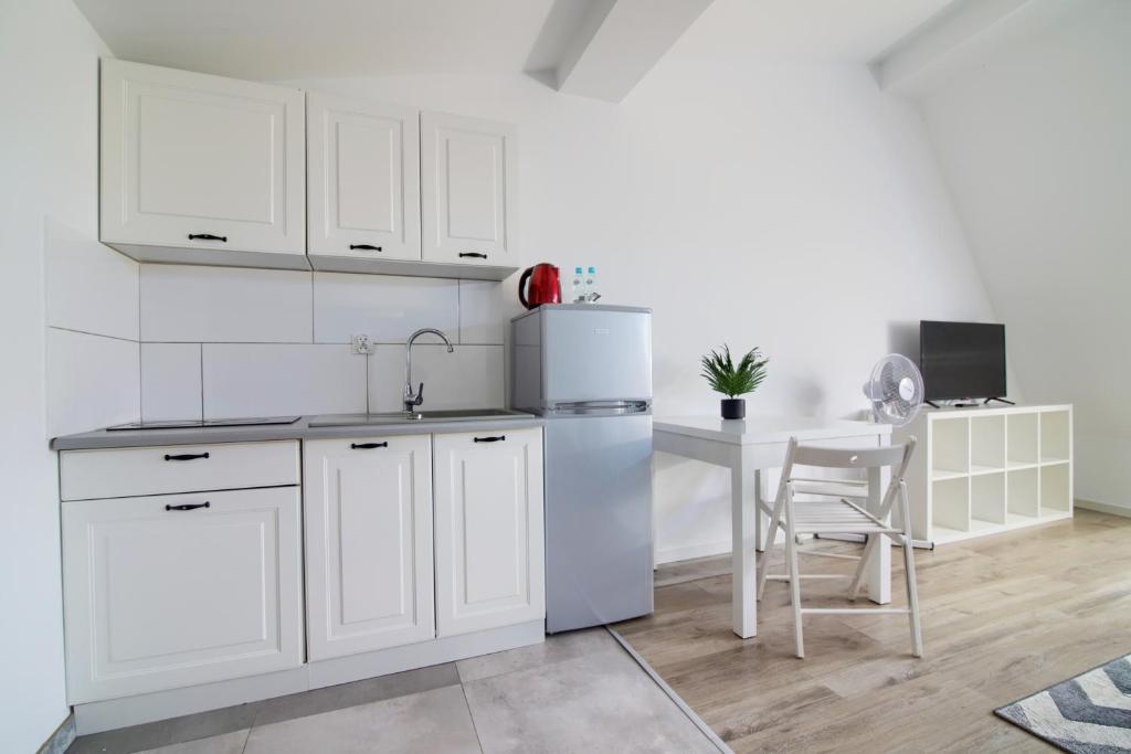 Apartments IN - Plater - Resim 13