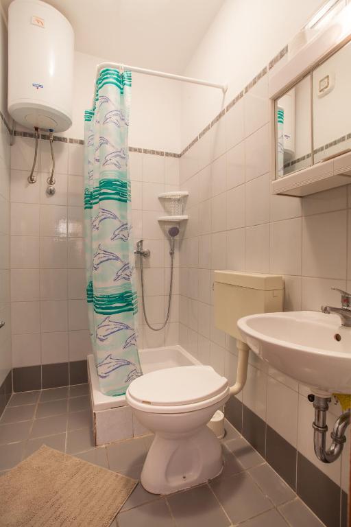 Koupelna v ubytování Apartmani Komešić