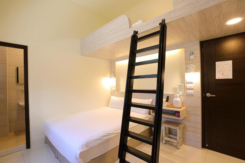 Postel nebo postele na pokoji v ubytování Cheese Cookie Homestay