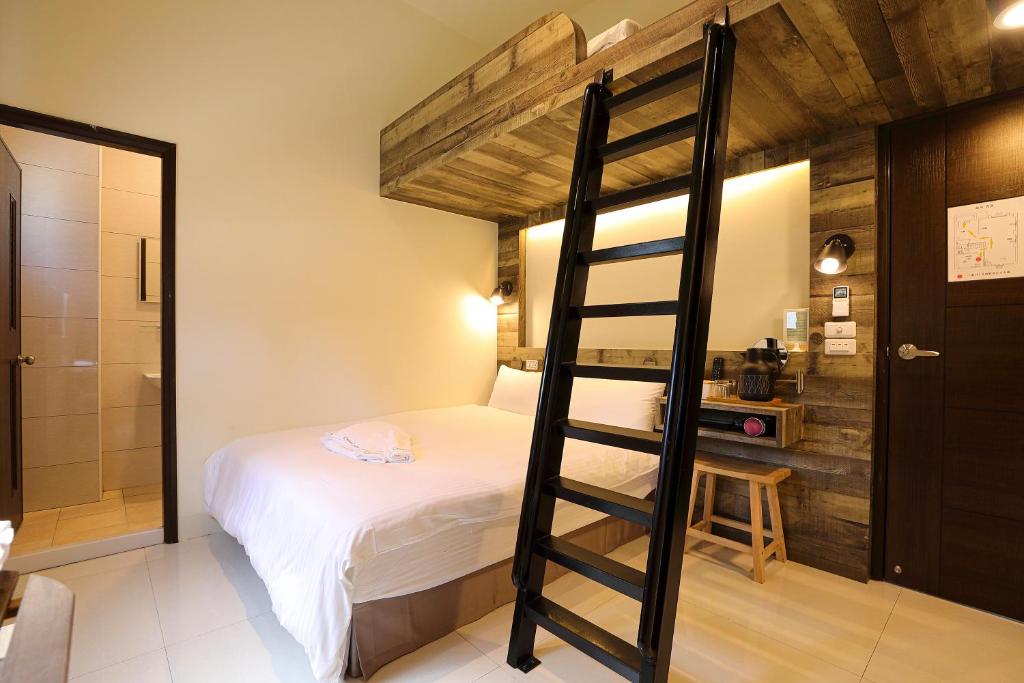 Postel nebo postele na pokoji v ubytování Cheese Cookie Homestay