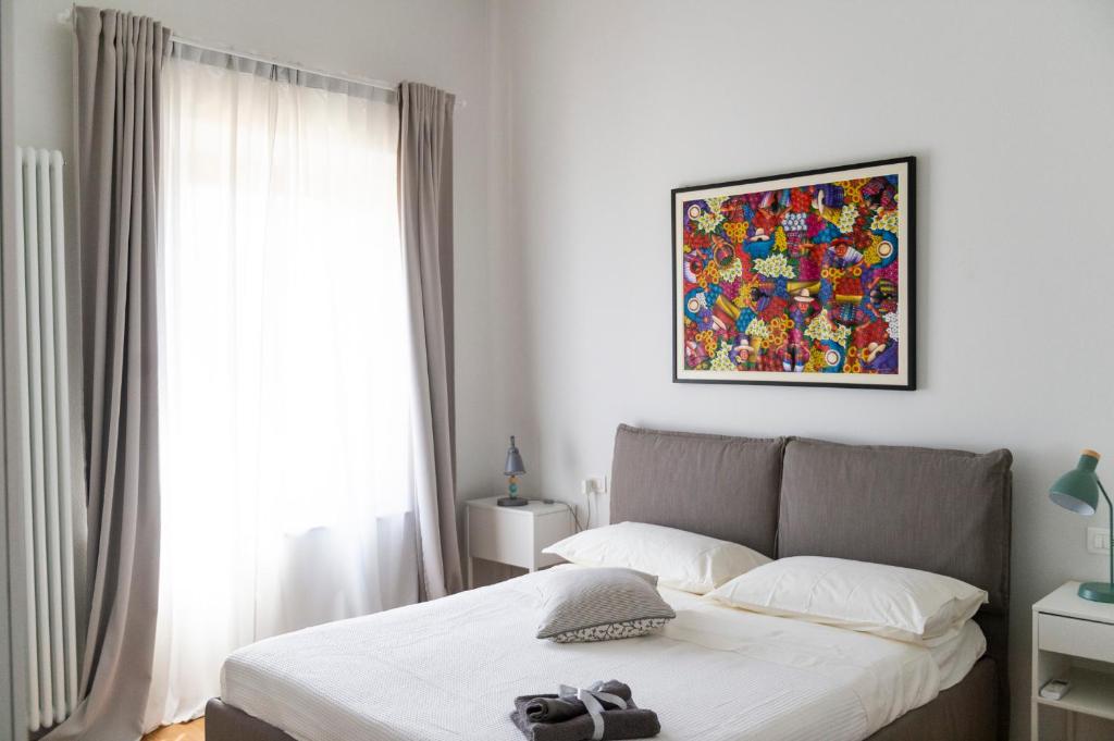 Łóżko lub łóżka w pokoju w obiekcie Gualchierina apartment