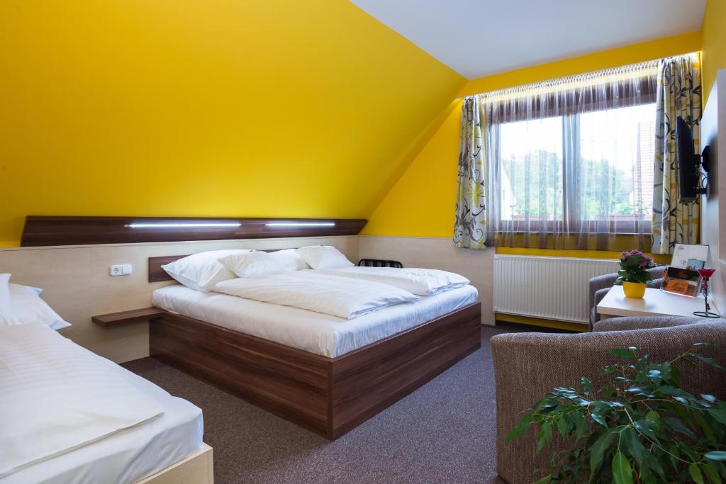 Hotel Mayer Alsóörsにあるベッド