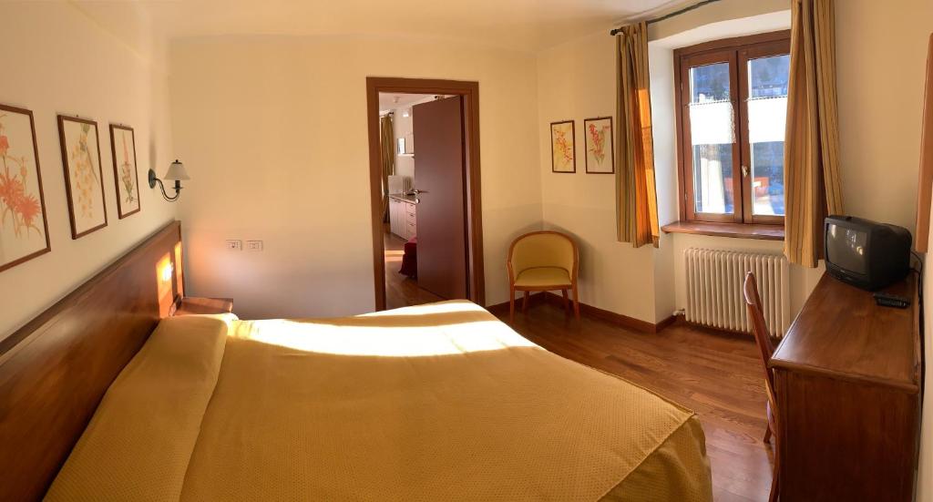 A television and/or entertainment centre at R.T.A. Hotel Monte Rosa