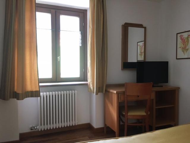 A television and/or entertainment centre at R.T.A. Hotel Monte Rosa
