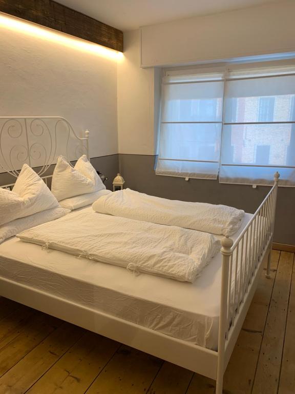 เตียงในห้องที่ Guest House In Contrà