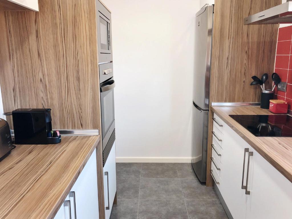 Kuchyň nebo kuchyňský kout v ubytování Chalet Mia Sear Areas