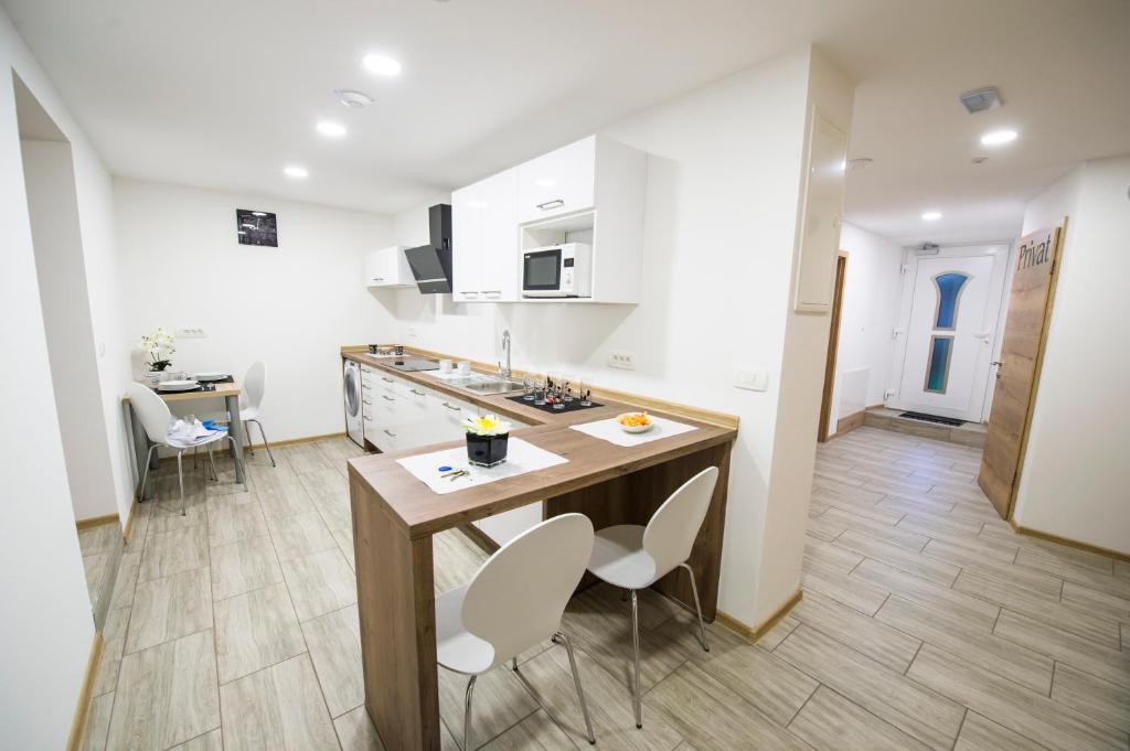 TV a/nebo společenská místnost v ubytování Guesthouse Urša