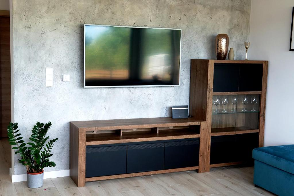 TV a/nebo společenská místnost v ubytování Regatowa Przystań