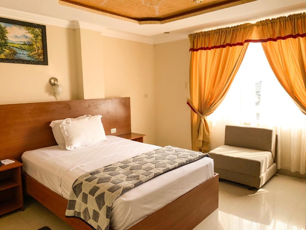 Postel nebo postele na pokoji v ubytování Hotel Somagg
