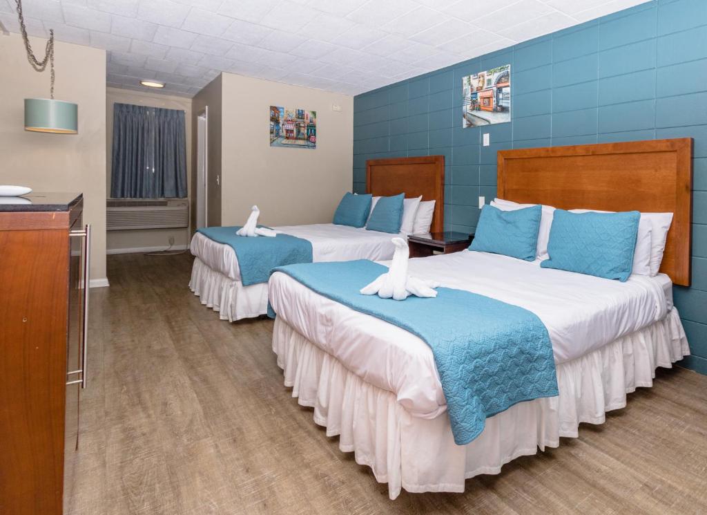 Postel nebo postele na pokoji v ubytování Charlroy Motel