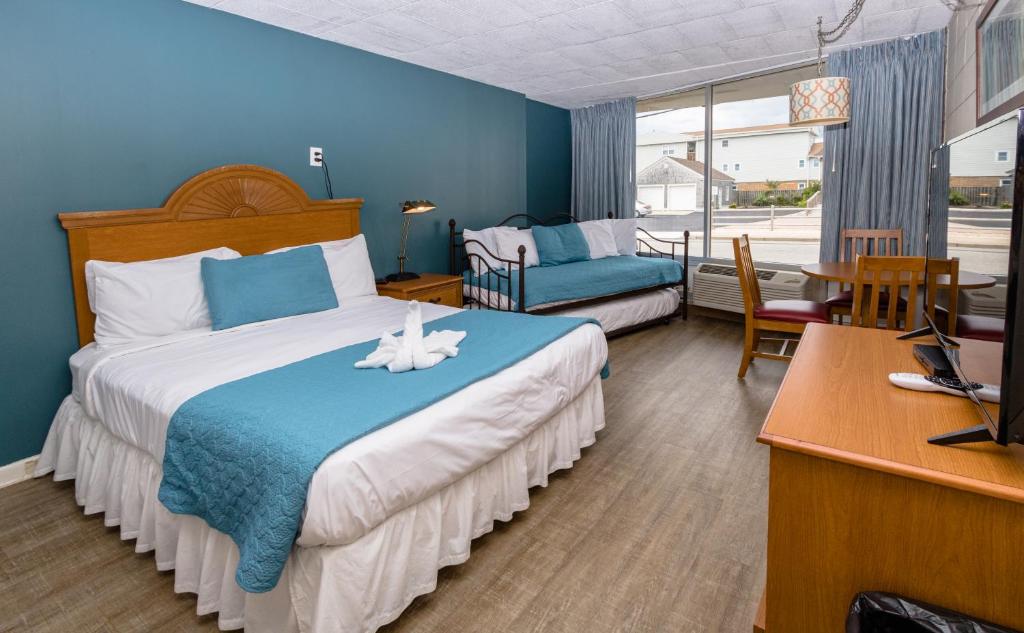 Postel nebo postele na pokoji v ubytování Charlroy Motel
