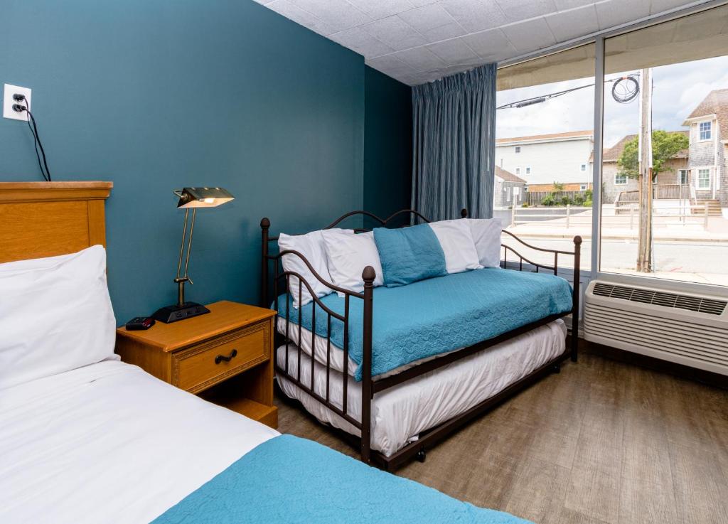 Postel nebo postele na pokoji v ubytování Charlroy Motel