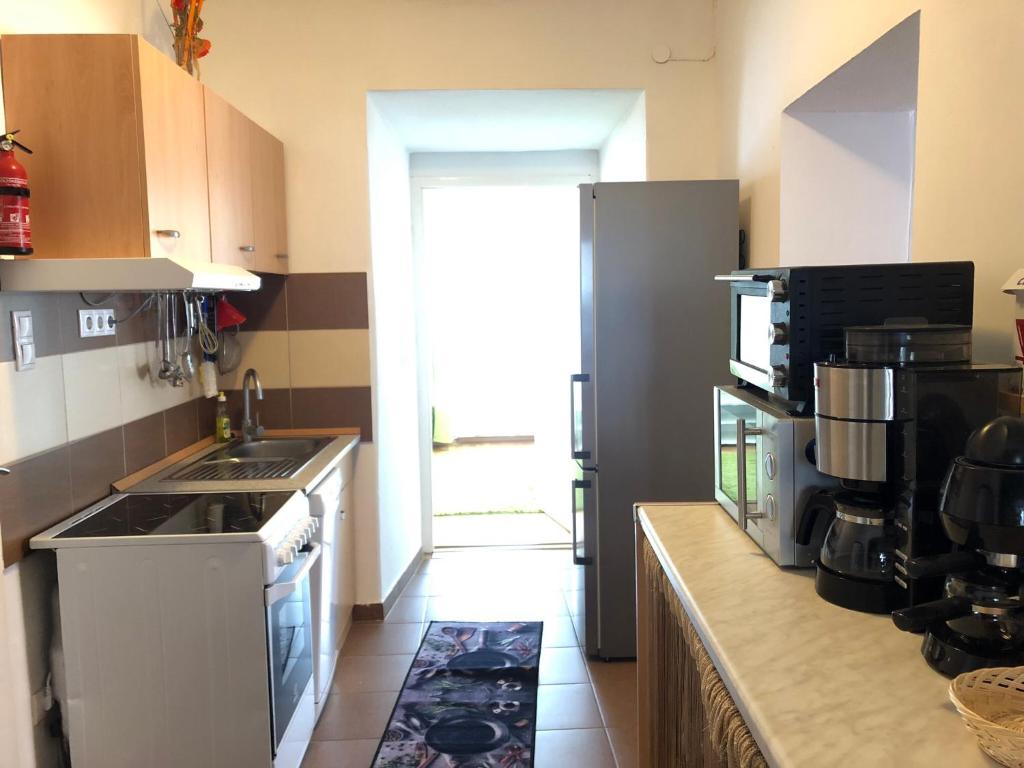 Kuchyň nebo kuchyňský kout v ubytování Apartment zur Brücke