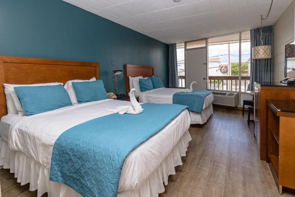 Postel nebo postele na pokoji v ubytování Charlroy Motel