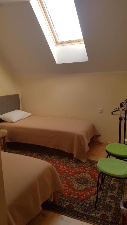Postel nebo postele na pokoji v ubytování Peipsi Lake House