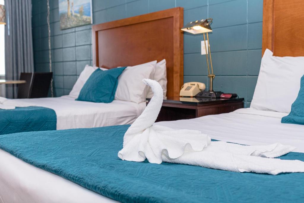 Postel nebo postele na pokoji v ubytování Charlroy Motel
