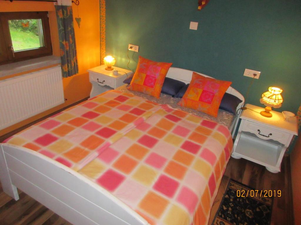 Postel nebo postele na pokoji v ubytování La Muria Apartment