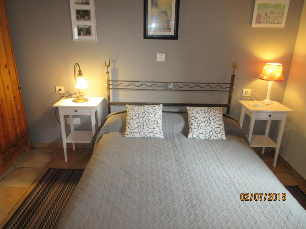 Postel nebo postele na pokoji v ubytování La Muria Apartment