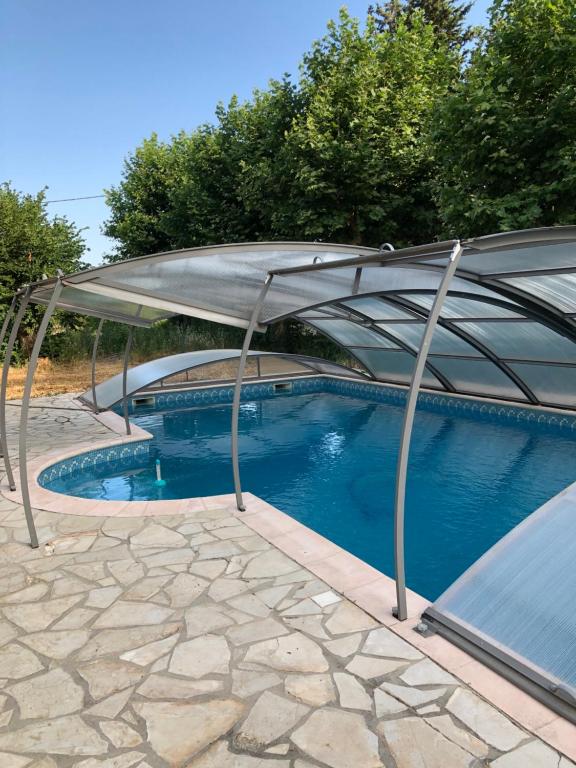 Bazén v ubytování LA BASTIDE DU GINESTE - Olives nebo v jeho okolí