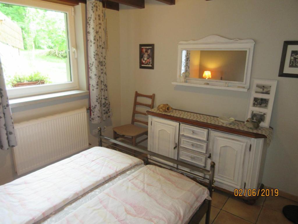 Postel nebo postele na pokoji v ubytování La Muria Apartment