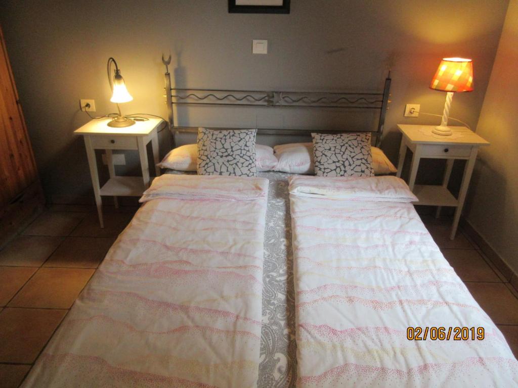 Postel nebo postele na pokoji v ubytování La Muria Apartment
