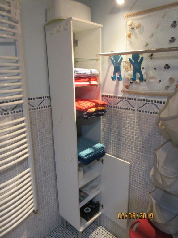 Palanda nebo palandy na pokoji v ubytování La Muria Apartment