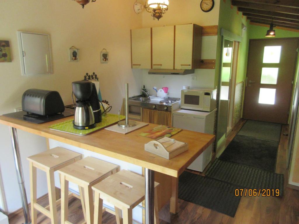 Kuchyň nebo kuchyňský kout v ubytování La Muria Apartment