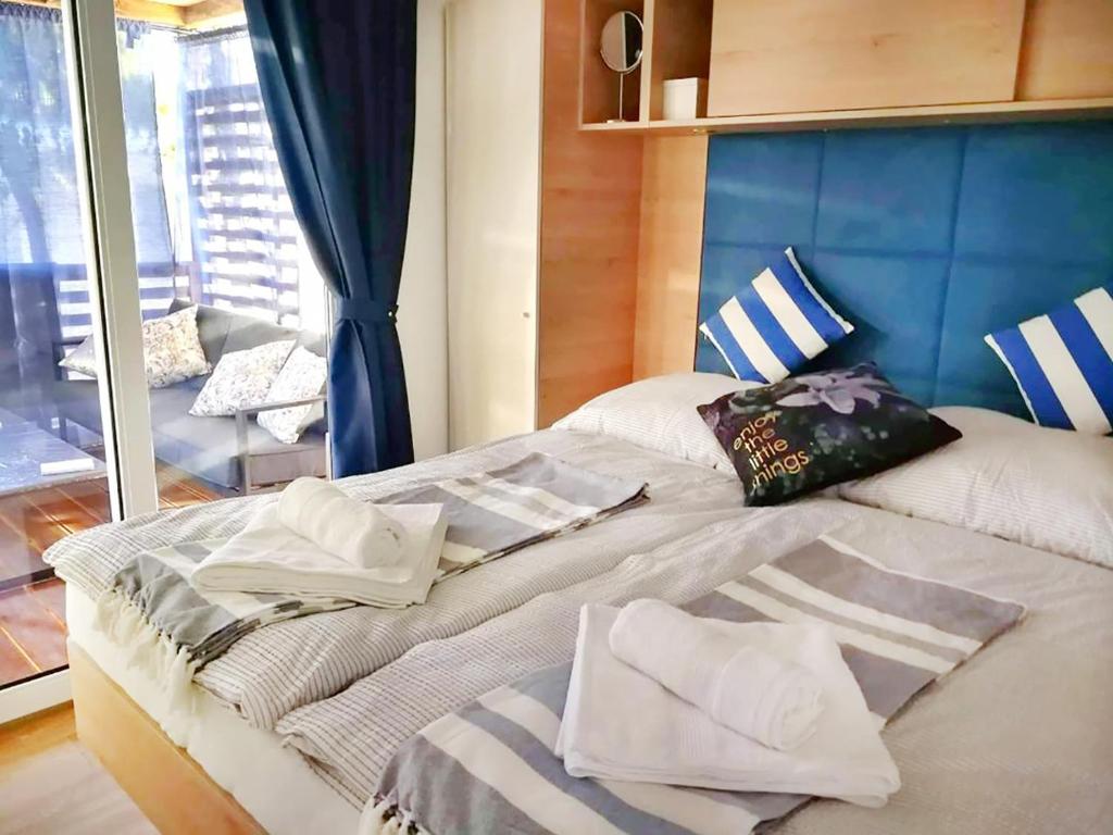 Postel nebo postele na pokoji v ubytování Mobile Home HappyNest