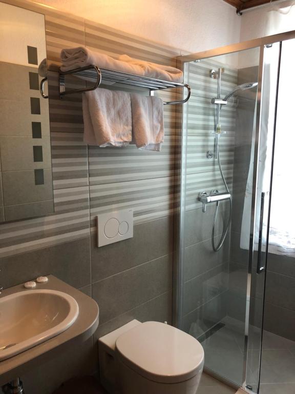 Koupelna v ubytování Hotel Kalemi