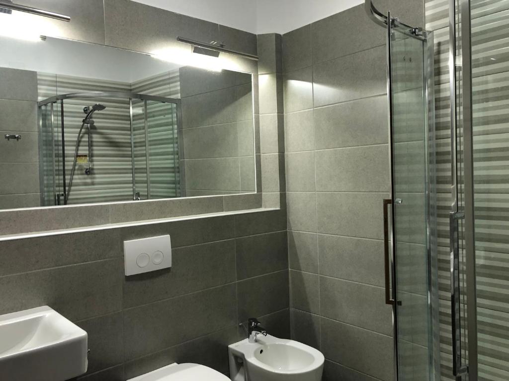 Koupelna v ubytování Hotel Kalemi