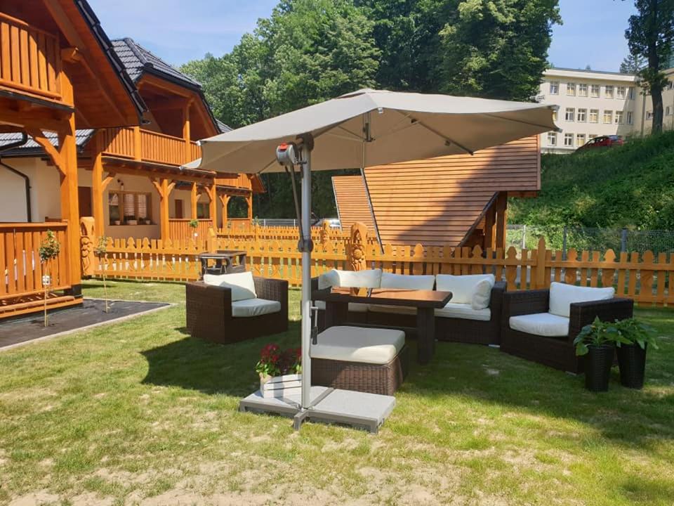 Vonkajšia záhrada v ubytovaní Osada Słoneczny Zdrój